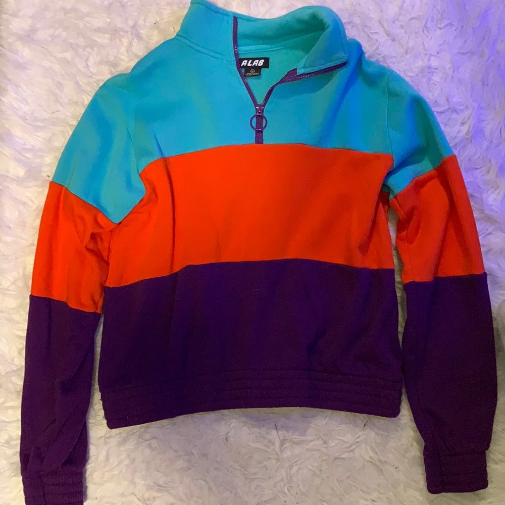 teal, orange and purple quarter zip